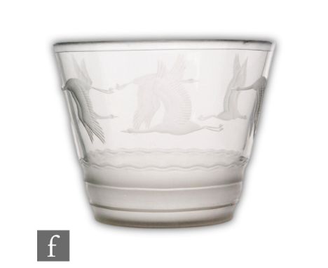 A 1930s Orrefors pale smoke grey crystal glass vase of flared cylindrical form designed by Simon Gate, with a band of cranes 