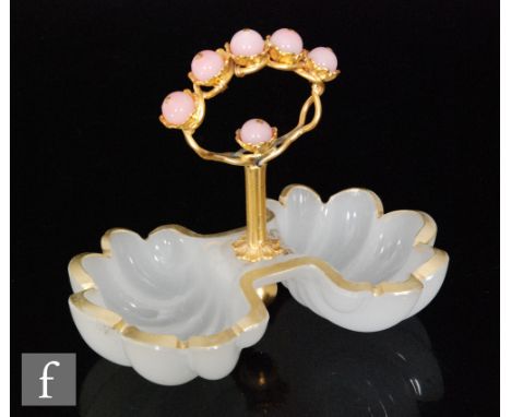 A late 19th Century French pin dish in opal glass modelled as twin scallop shells with gilded detail mounted with a central g