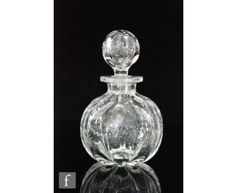 A late 19th Century scent bottle of pillar moulded globe form, intaglio cut and polished with flowering prunus blossom, with 