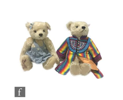 Two Steiff teddy bears, Joseph and the Amazing Technicolor Dreamcoat bear, white tag 037238, ecru mohair, wearing silk multi-