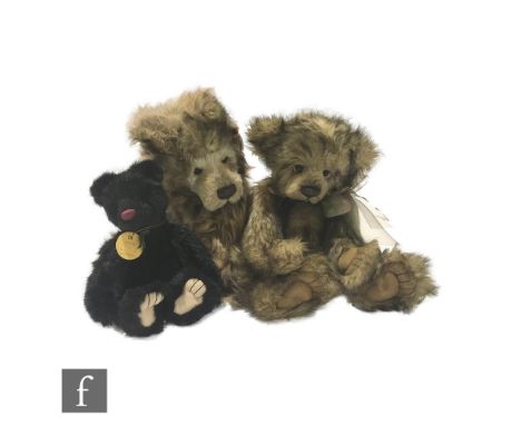 Three Charlie Bears teddy bears, designed by Isabelle Lee, Tom (CB 104739), black plush, height 29cm, Trevor (CB 114819), bro
