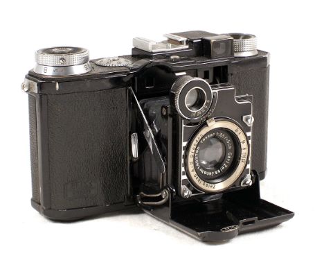 Black Zeiss Ikon Super Nettel CRF Camera. (condition 4F). With Tessar 5cm f3.5 lens. With ever-ready case. {cabinet E}