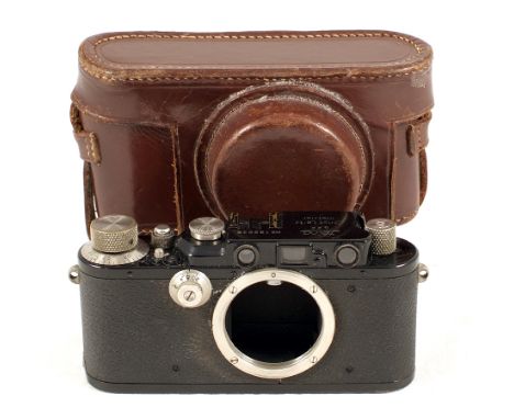 Black Leica III Camera Body. #192638. Slight paint wear and brassing to edges (condition 5F). With aftermarket case. {cabinet