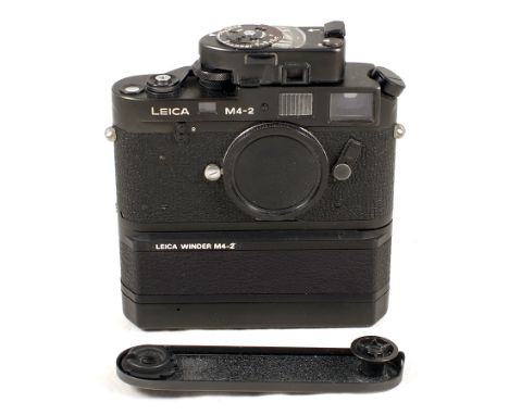 BLACK Leitz Canada Leica M4-2 Camera Body. #1502162. Light marks to body and slight damage to leatherette in 2 places (condit