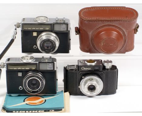 Three Soviet 35mm Compact Cameras. Smena I (L10) with T-22 f4.5 40mm lens and case Smena-2; Chaika 3 (meter working, intercha