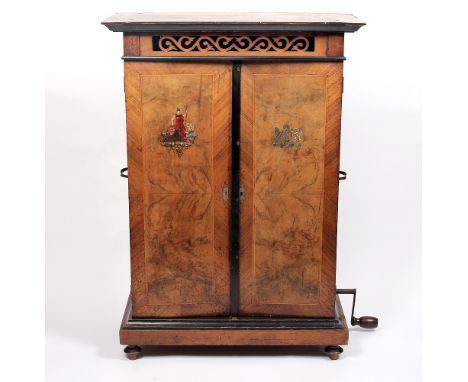 A late 19th-century Britannia floorstanding disc musical cabinet by B.H Abrahams, St Croix Switzerland, playing seventeen inc