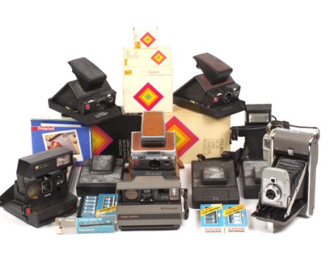 SX-70 and Other Polaroid Instant Cameras. To include Polaroid 660, Land & Spectra cameras (untested), a SX-70 flash unit & ot