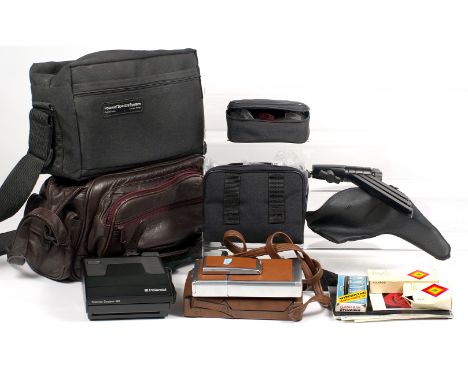 Polaroid SX70 & Accessories. Chrome and tan SX-70 folding instant print camera with case; Polaroid Spectra with Polaroid mode