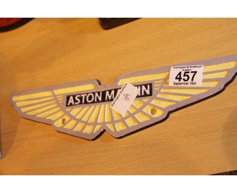 Cast iron Aston Martin wings sign, L: 33 cm. P&amp;P Group 2 (£18+VAT for the first lot and £3+VAT for subsequent lots) 