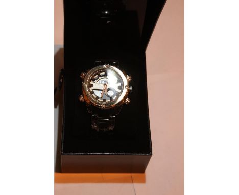 New boxed Michael Phillipe black and gold dial wristwatch. P&amp;P Group 1 (£14+VAT for the first lot and £1+VAT for subseque