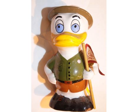 Ceramic boy scout duck with flag moneybox and a Baden Powell teaspoon. P&amp;P Group 2 (£18+VAT for the first lot and £3+VAT 