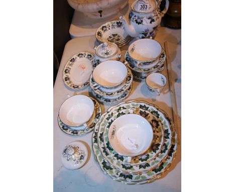 Booths crockery in Jade Lotus pattern, 6x bowls with handles, 5 saucers; coffee pot; 4 bowls; 1 side plate; 3 salad plates; 3