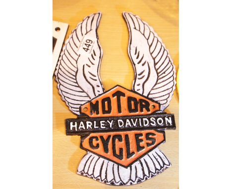 Cast iron Harley Davidson wings sign, H: 30 cm. P&amp;P Group 2 (£18+VAT for the first lot and £3+VAT for subsequent lots) 