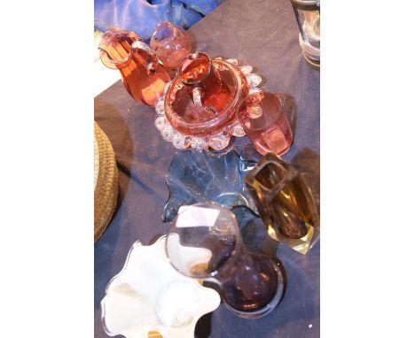 Five cranberry glass items. P&amp;P Group 2 (£18+VAT for the first lot and £3+VAT for subsequent lots) 
