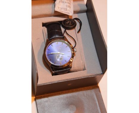 New boxed Anthony James blue and silver dial wristwatch on leather strap. P&amp;P Group 1 (£14+VAT for the first lot and £1+V