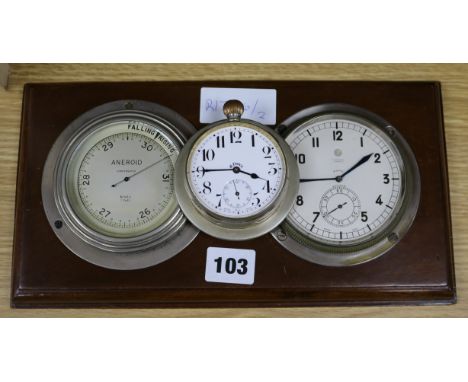 An early 20th century wall mounted eight day timepiece and aneroid barometer, by Benzie of Cowes, and an eight day motoring t