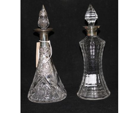 Two repousse silver mounted scent bottles, a Continental mounted phone book & comb.