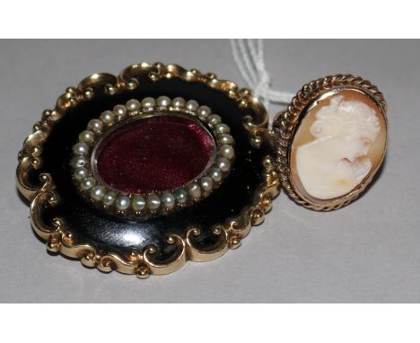 A gold cameo ring and gold mourning brooch.