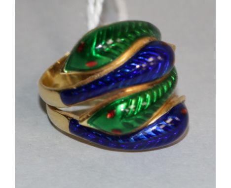 An 18K gold and enamel 'serpent's head' ring, size L.