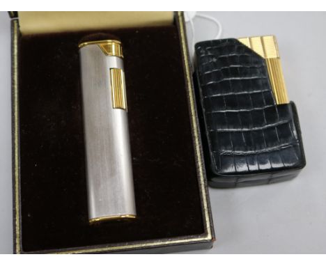 A cased Dunhill lighter and a Dupont lighter.