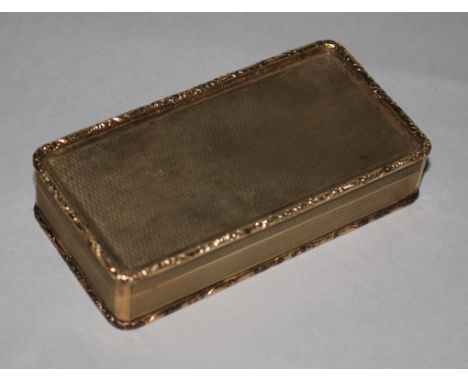 A 1960's engine turned 9ct gold rectangular snuff box, with scroll and bead edges, 108gms, 93mm.