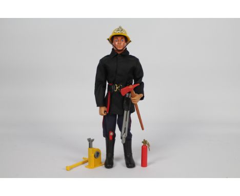 Palitoy, Action Man - A Palitoy Eagle-Eye Action Man figure in Fireman outfit. The dark brown flock haired figure with grippi