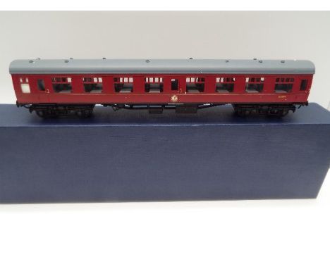 Easy-Build - an O gauge, kit built model Mk 1 passenger corridor carriage, crimson livery, op no E3777, appears mint in box  