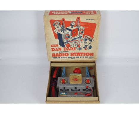 Merit - Dan Dare - A boxed vintage Dan Dare Space Control Radio Station # 3110 .The items show some signs of age and use and 
