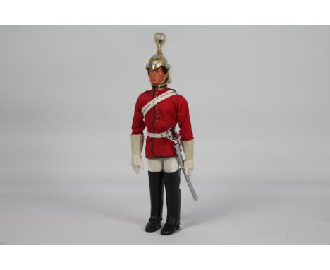 Palitoy, Action Man - A Palitoy Eagle-Eye Action Man figure in Life Guard outfit. The dark brown flock haired figure with gri