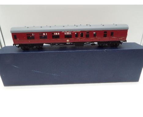 Easy-Build - an O gauge, kit built model Mk 1 passenger carriage, corridor brake, crimson livery, op no E34007, appears mint 