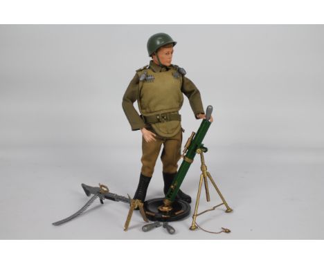 G.I. JOE, Hassenfeld,  Action Man - A Canadian made G.I. JOE / Action Man figure in Infantry Support Weapons outfit. The blon