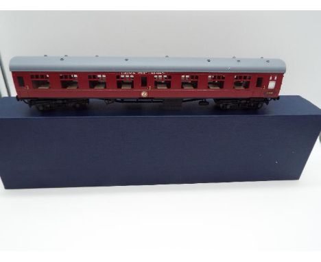 Easy-Build - an O gauge, kit built model Mk 1 passenger carriage, crimson livery, op no E3855, appears mint in box  (this doe