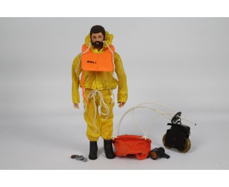 Palitoy, Action Man - A Palitoy Action Man figure in R.N.L.I. Sea Rescue outfit. The dark brown flock haired bearded figure w
