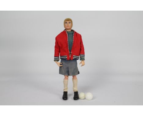 Palitoy, Action Man - A Palitoy Action Man Chelsea FC Footballer figure with sideburns. The blonde flock haired, figure with 