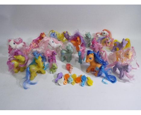 Hasbro - My Little Pony - A collection of My Little Pony figures including G1 Lemondrop, G2 Sweetberry, G3 Sparkleworks, G3 W
