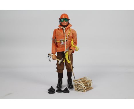 Palitoy, Action Man - A Palitoy Action Man figure in Mountaineer outfit. The eagle-eye, black  flock haired, ''muscle' body f