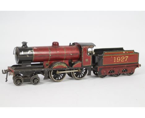 Bassett Lowke - A clockwork O Gauge 4-4-0 loco named Duke Of York number 1927. The loco shows signs of age and use dents and 