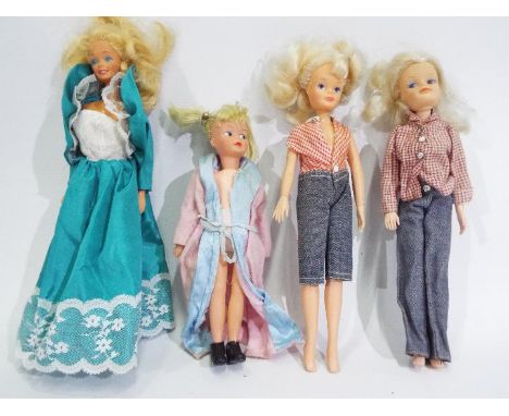 Sindy - Patch - Barbie - A collection of four dolls including a 1967 to 70 Patch doll in a pink dressing gown, a modern Barbi