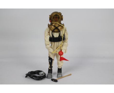 Palitoy, Action Man - A Palitoy Action Man figure in Deep Sea Diver outfit. The figure is a n eagle-eye blonde hair example -