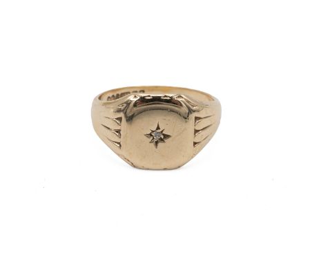 9ct gold hallmarked mens signet ring set with a central diamond and with rib decoration to the shoulders, size R, weight 5.3 