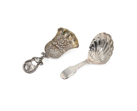 Two silver caddy spoons, a Victorian spoon decorated with a handle of a grape vine with leaf and grapes to the shovel, hallma