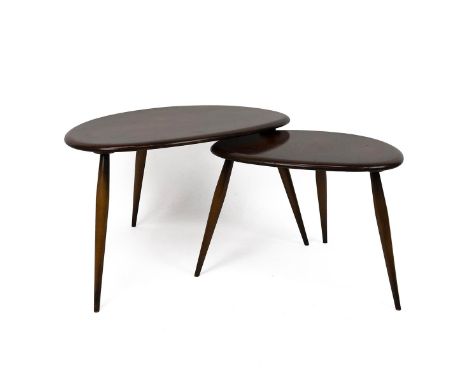 Two Ercol Pebble coffee tables, blue maker label to underside of larger. Smallest table in nest not present. Largest table W 