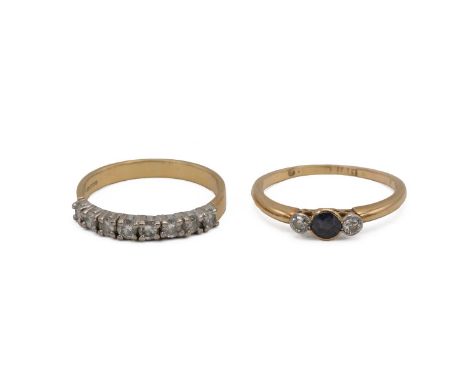 Two 18ct gold hallmarked rings. a diamond half eternity ring set with eight diamonds weight 3.2 grams., size R. Together with