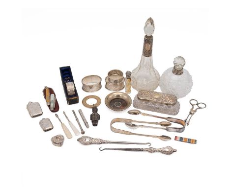 Collection of silver and silver plated items to include four silver hallmarked napkin rings, two silver hallmarked collared s