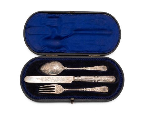 A three-piece hallmarked silver Christening set with engraved folate decorations in a tooled leather case with fitted velvet 