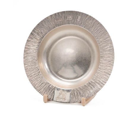Gerald Benney London silver dish with bark decorated rim and an emblem depicting a crown and wolf, hallmarked London 1991. By