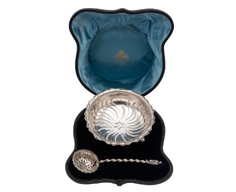 Victorian silver cased muffineer set, the bowl with gadroon decorated rim with swirls and a star to the well, raised on three
