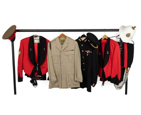 Collection of military uniforms and three hats, including Royal Engineers' dress uniform, mess uniform, and overseas deployme