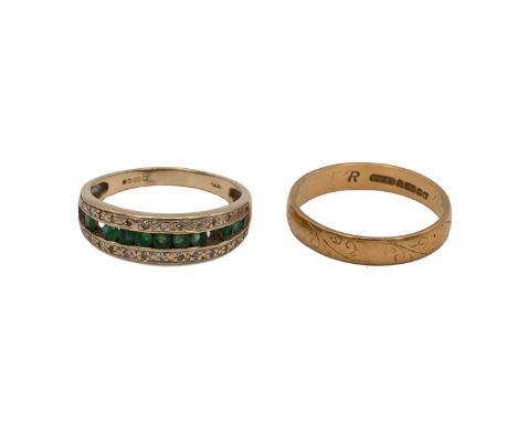 An 18ct gold wedding band 3.1 grams size Q and a 9ct gold diamond and emerald dress ring 2.5 grams size R. (2)
