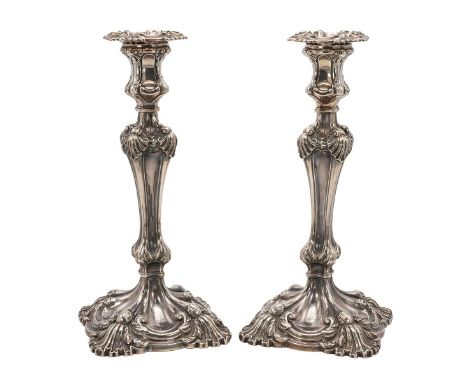 A pair of William IV cast silver candlesticks, each with detachable sconces, Sheffield 1837, John Waterhouse, Edward Hatfield